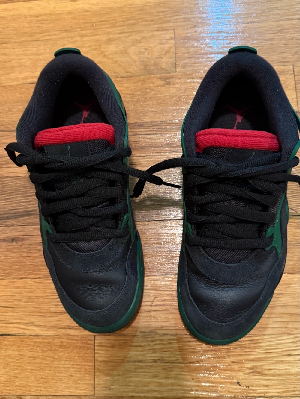 Jordan Kids Black Sneakers with Green Trim and Red Tongue